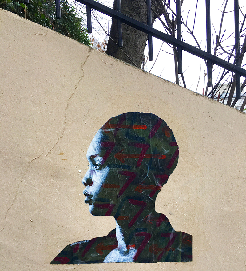 Profil de Femme Africaine au fond vert / Paris, France